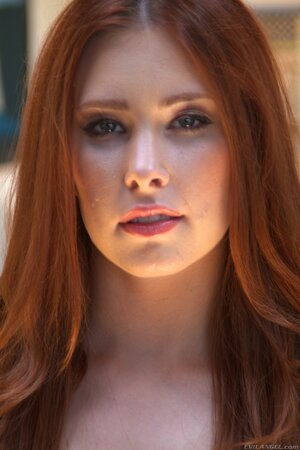 Melody Jordan grabs her ass after pulling down sexy leggings