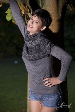 Coco de Mal goes topless in denim shorts in the woods