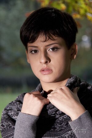 Coco de Mal goes topless in denim shorts in the woods