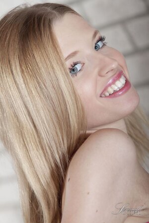 Natural blonde Angel Hot spreads her legs in cotton panties and fondles her tiny tits