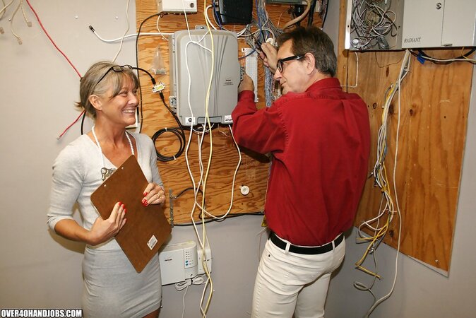 Naughty mature lady Leilani Li enjoys sensually jerking off a big cock