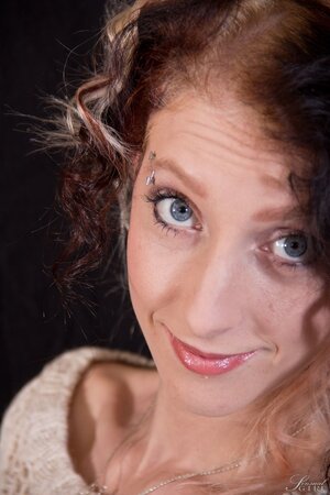 Amateur starlet with blue eyes and a skinny body posing for you