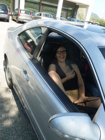 Rosy B plays with her pussy in the car and then gives a blowjob in the house