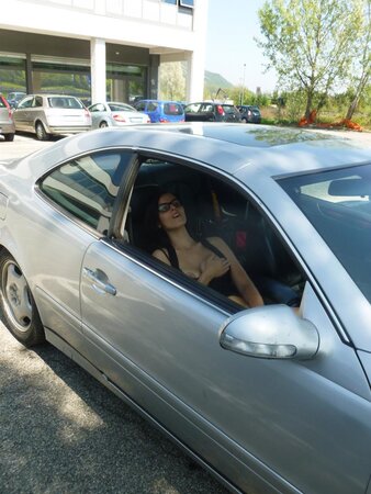 Rosy B plays with her pussy in the car and then gives a blowjob in the house