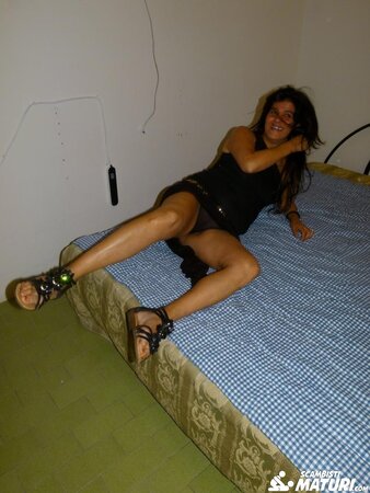 Gianna Michaels enjoys a car ride after getting a mouthful of cum with Sandra M