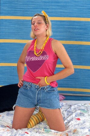 Beautiful teen Kitty D shows off her yummy pussy up close after toying with dildos