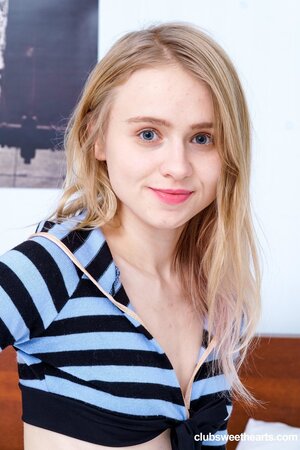 Hot Russian teen Light Fairy enjoys fingering herself with her sexy feet up in the air