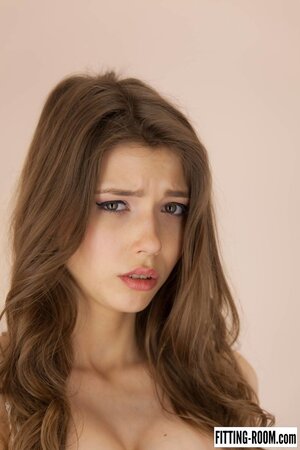 Cute babe Mila Azul finger fucks her hairless pussy on the chair