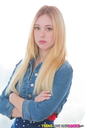 Lucy Tyler demonstrates her shaved pussy and tight ass