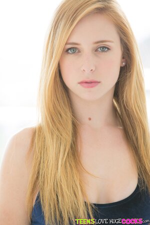 Blonde Taylor Whyte enjoys playing with her pussy while spreading her legs