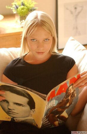 Incredible blonde reads and teases a lot on a sunny day