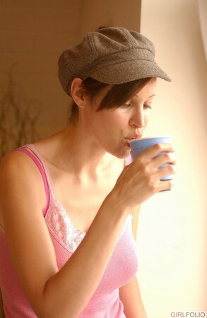 Amanda Swan strips her sexy underwear to expose her large big tits