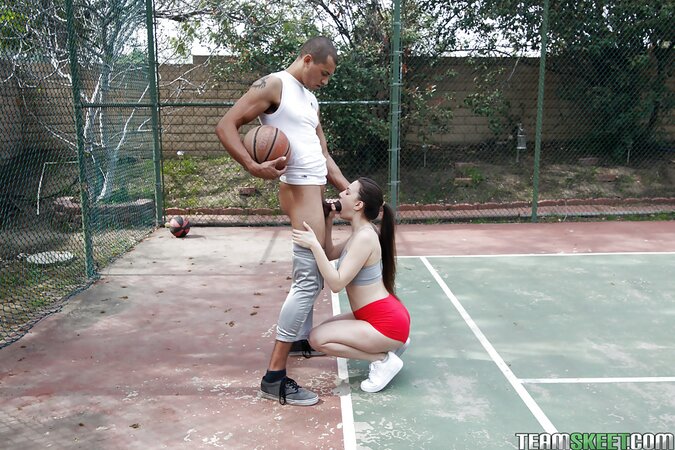 Alexis Rodriguez gives a blowjob to a long black cock outside