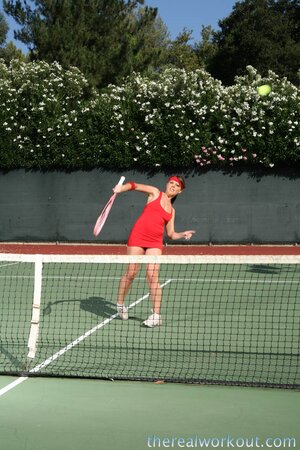 Penny Flame flaunts her hot ass and deep cleavage in a tennis dress