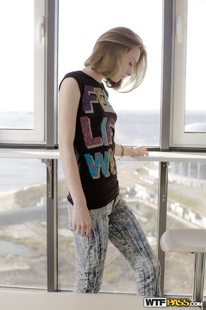 Serpente removes her top and exposes her small young girl breasts