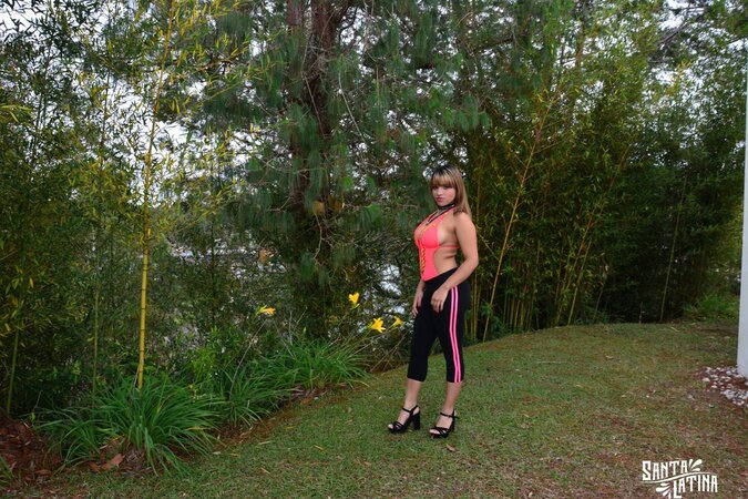 Kathy Solis flaunts her juicy booty in a mini bikini outdoors