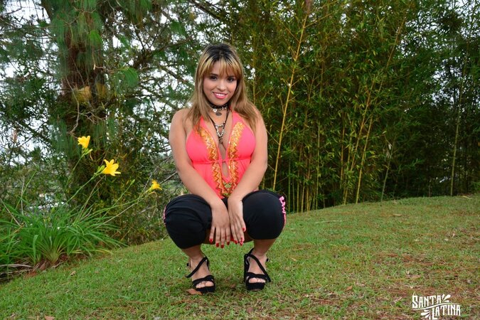 Kathy Solis flaunts her juicy booty in a mini bikini outdoors