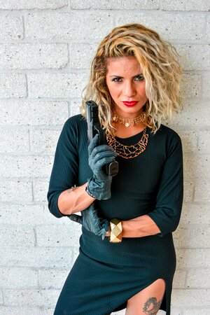 Laura Montenegro poses with her gun and fucks a gangster