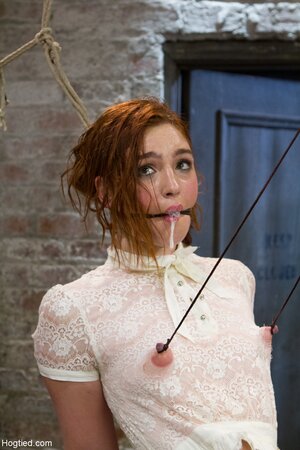 Jodi Taylor gets punished with a vibrator in bondage