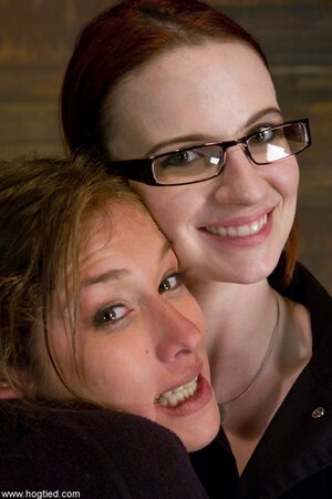 Felony fucks Claire Adams with a strapon in BDSM lesbian action