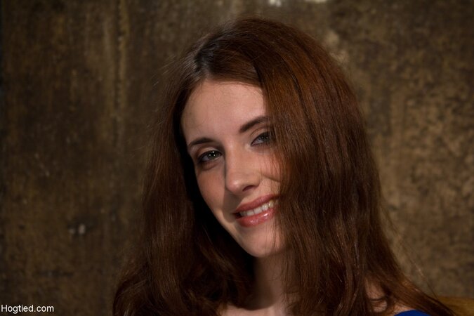 Comely redhead Iona Grace enjoys being punished with a vibrator in rope bondage