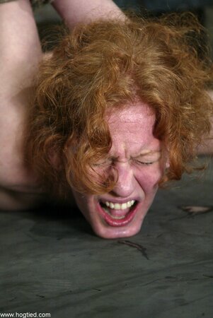 Sye Rena gets whipped and punished with a vibrator in rope bondage