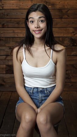 Brunette teen Harmony Wonder gets tied up and toyed by a device