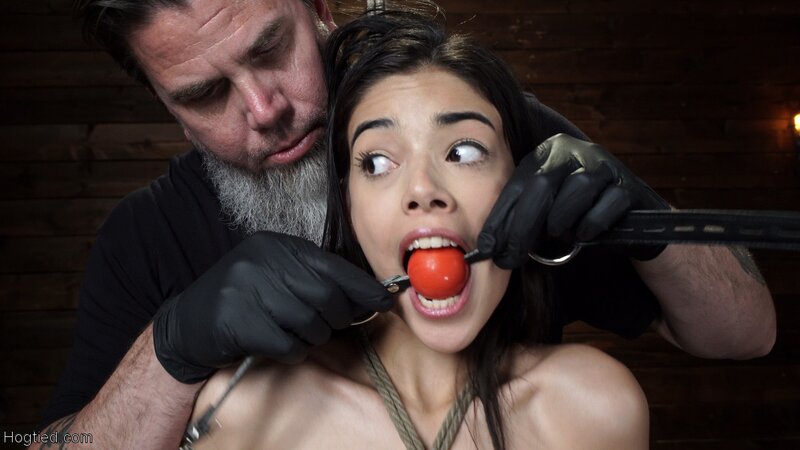 Brunette teen Harmony Wonder gets tied up and toyed by a device