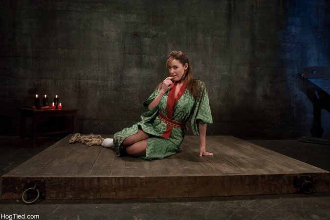 Christina Carter gets tied up for hot wax treatment