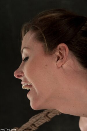 Christina Carter gets tied up for hot wax treatment