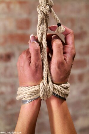 Isis Love gets punished with a vibrator while naked in rope bondage