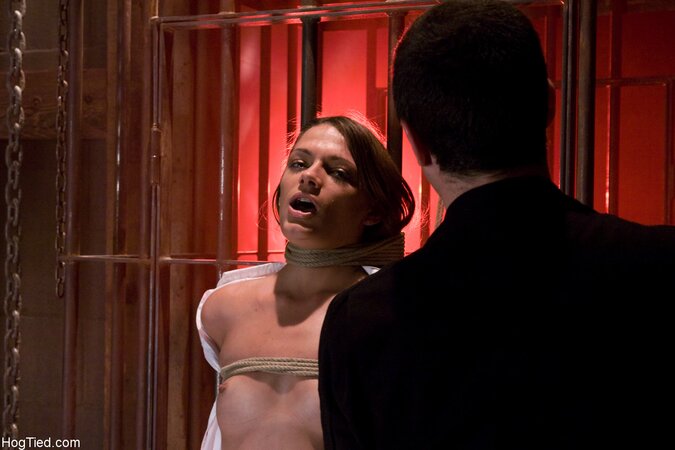 Teen enjoys being hogtied in nude pictures