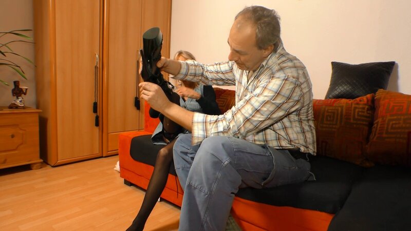 Margit S enjoys being fucked on the red couch in black lace lingerie