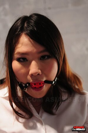 Aki Sasahara gagged in white blouse and black skirt