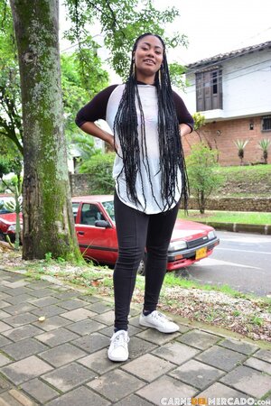 Tattooed Morelia Mazo teases massive ass on bar chair