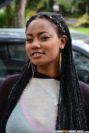 Tattooed Morelia Mazo teases massive ass on bar chair