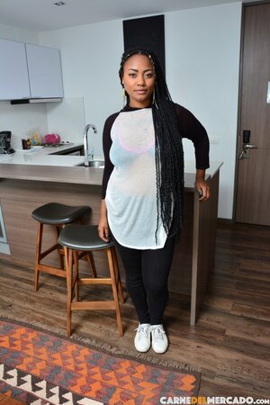 Tattooed Morelia Mazo teases massive ass on bar chair