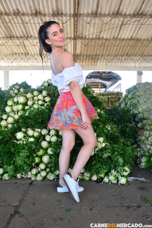 Market vendor Karol Higuita flashes shaved pussy in lingerie