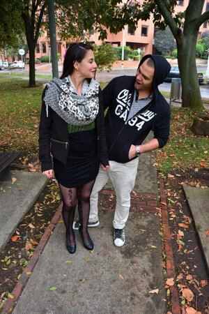 Stylish scarf Latina is going to pose in a cute way in public