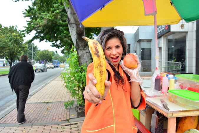 Fruit seller Laura Montenegro teases hard with banana