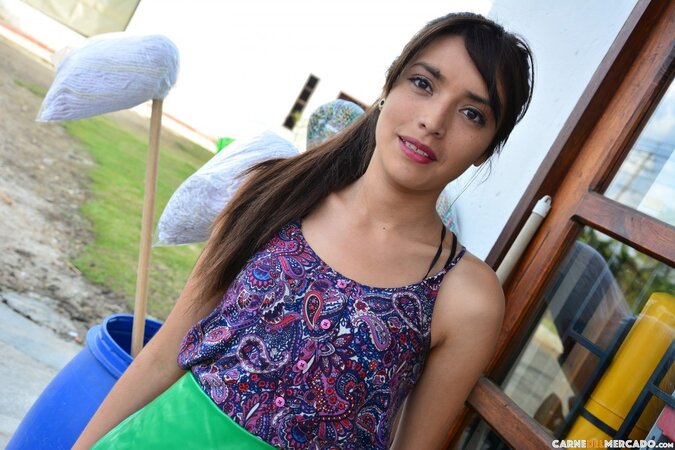 Veronica Marin shows her ass in black lingerie in the field