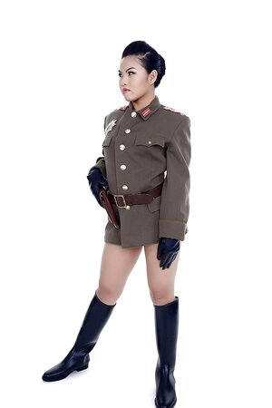 Asian Cindy Starfall poses solo in sexy military garb