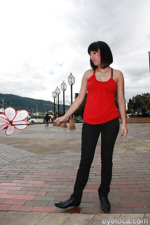 Girl with an unstylish hairdo showing her backside
