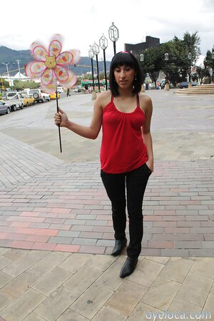 Girl with an unstylish hairdo showing her backside