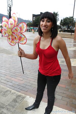 Girl with an unstylish hairdo showing her backside