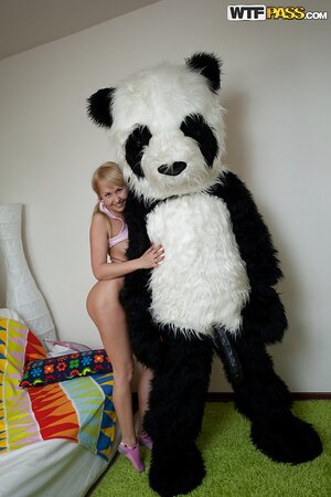 Tiny-tit teen stretches shaved slit with big fake cock