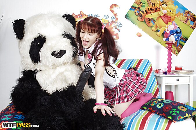 Pigtailed girl takes panda's huge fake dick all over