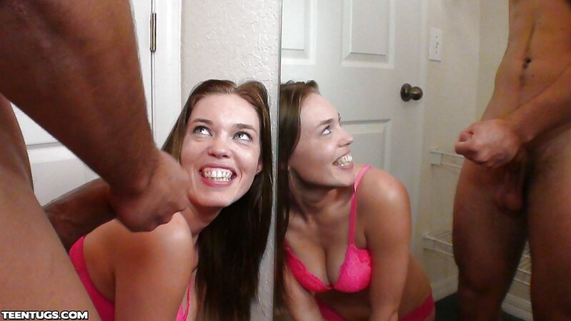 Lusty teen in lingerie strokes a cock until she takes a warm cumshot across her smiling face