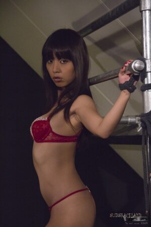 Adorable girl from Japan tied up by man who pours wax on her slim body