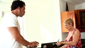 Short-haired granny welcoming the new neighbour with a BJ